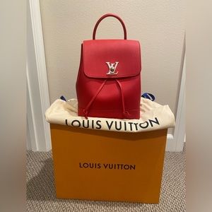 Louis Vuitton Red Lock Me Backpack.